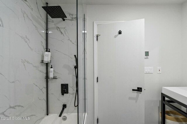 full bathroom featuring a combined bath / shower with marble appearance