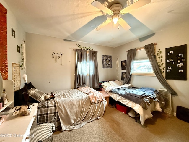 bedroom with carpet floors and ceiling fan