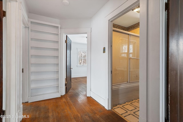 hallway featuring hardwood / wood-style floors