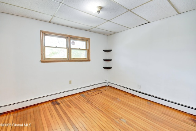 244 Kingsboro Ave, Gloversville, NY 12078 - unfurnished room featuring a paneled ceiling and baseboard heating