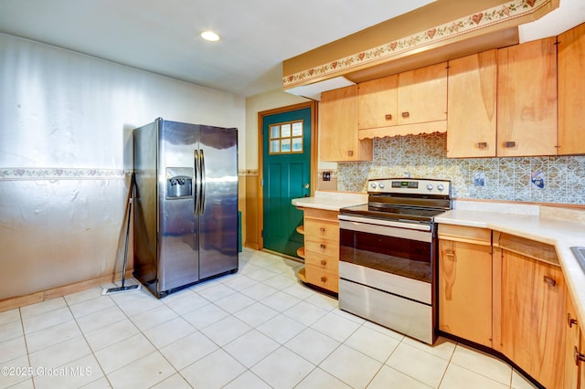244 Kingsboro Ave, Gloversville, NY 12078 - kitchen with electric range, fridge with ice dispenser, light countertops, tasteful backsplash, and recessed lighting