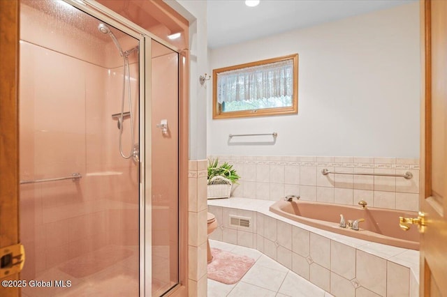 536 E Shore Dr, Horicon, NY 12808 - full bathroom featuring a stall shower, a bath, tile patterned flooring, and toilet