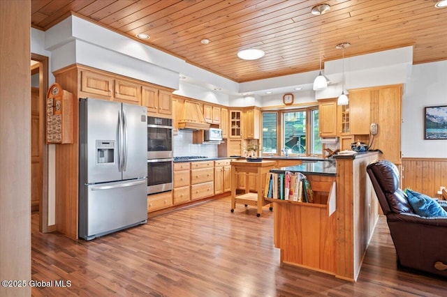 536 E Shore Dr, Horicon, NY 12808 - kitchen with stainless steel appliances, wooden ceiling, custom exhaust hood, glass insert cabinets, and dark countertops