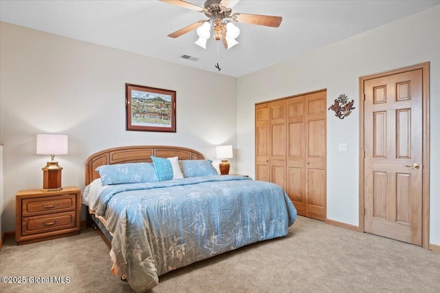 536 E Shore Dr, Horicon, NY 12808 - bedroom with light colored carpet, a closet, ceiling fan, and baseboards