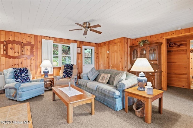 536 E Shore Dr, Horicon, NY 12808 - carpeted living area with wooden walls, a ceiling fan, and wood ceiling