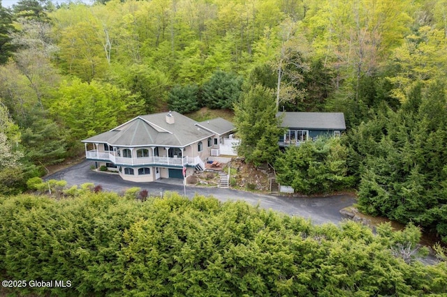 536 E Shore Dr, Horicon, NY 12808 - aerial view of property and surrounding area featuring a heavily wooded area