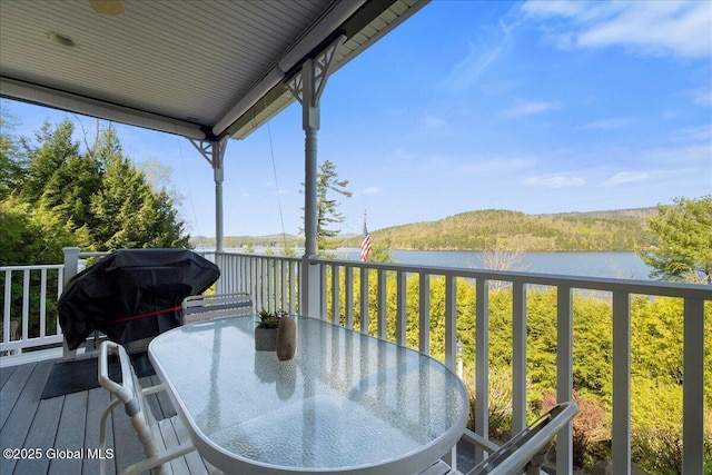 536 E Shore Dr, Horicon, NY 12808 - wooden deck with a water view, outdoor dining area, and a grill