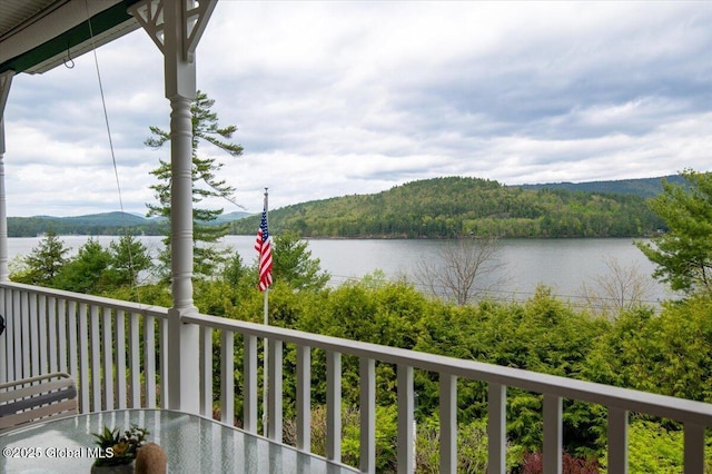 536 E Shore Dr, Horicon, NY 12808 - balcony featuring a water view and a forest view