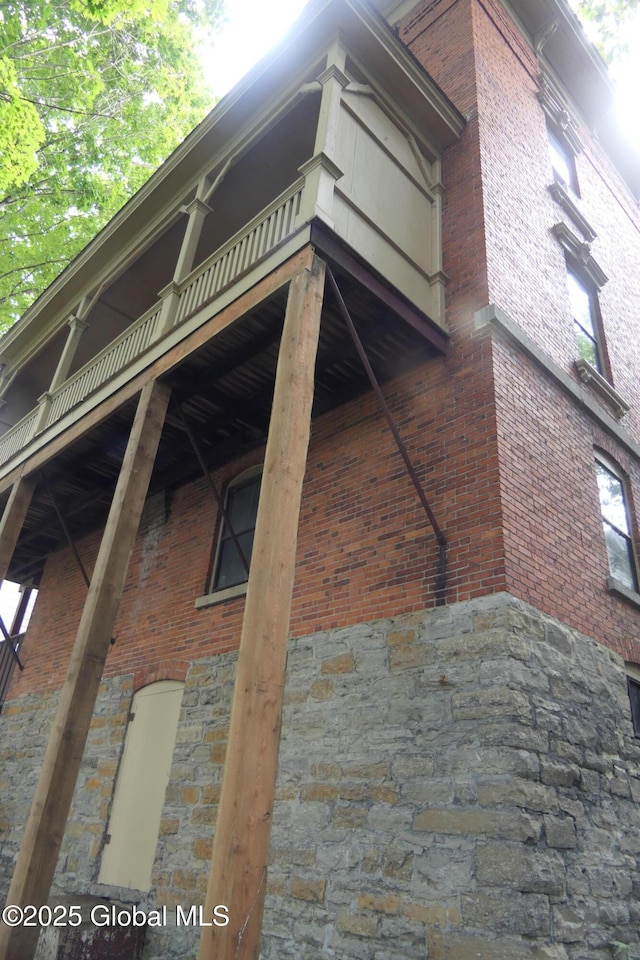 44 Cliff St, Canajoharie Village, NY 13317 - view of side of property featuring stone siding and brick siding