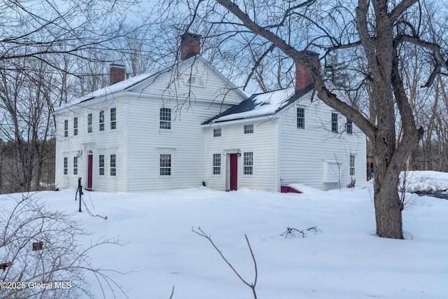 view of front of property with a chimney