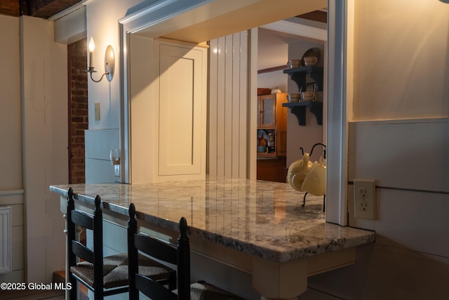 kitchen featuring stone countertops