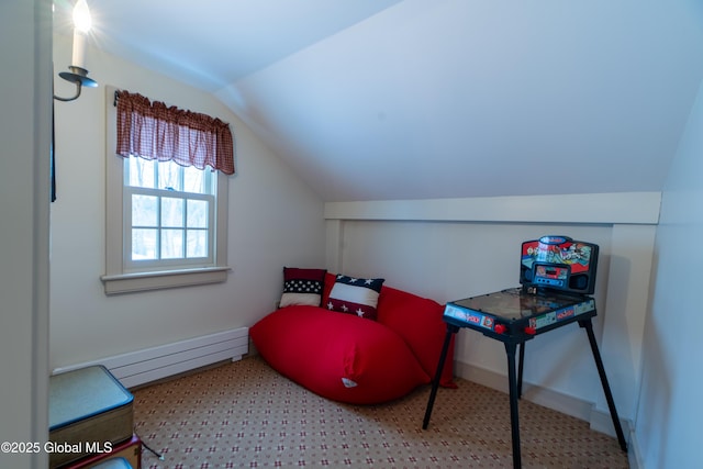 interior space with baseboards, baseboard heating, and vaulted ceiling