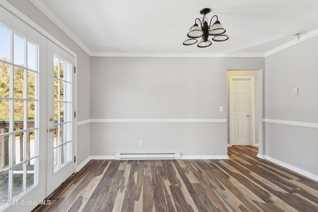 unfurnished dining area featuring crown molding, baseboards, baseboard heating, and wood finished floors