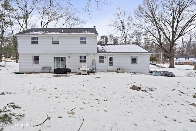 view of snow covered property