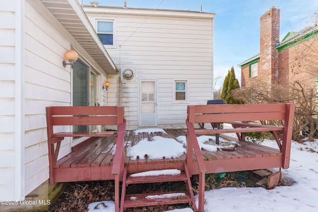 view of snow covered deck