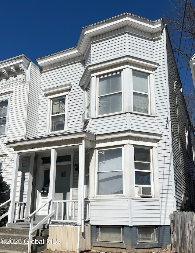 multi unit property featuring a porch