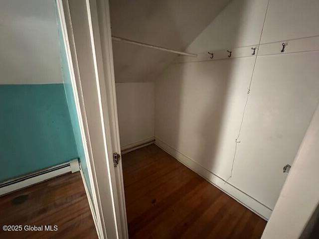 closet with a baseboard radiator