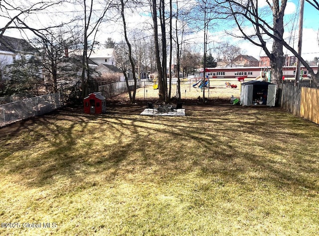 view of yard with a fenced backyard