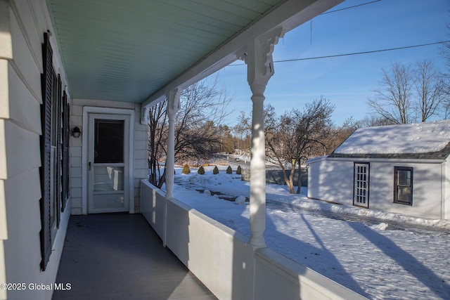 view of snow covered patio