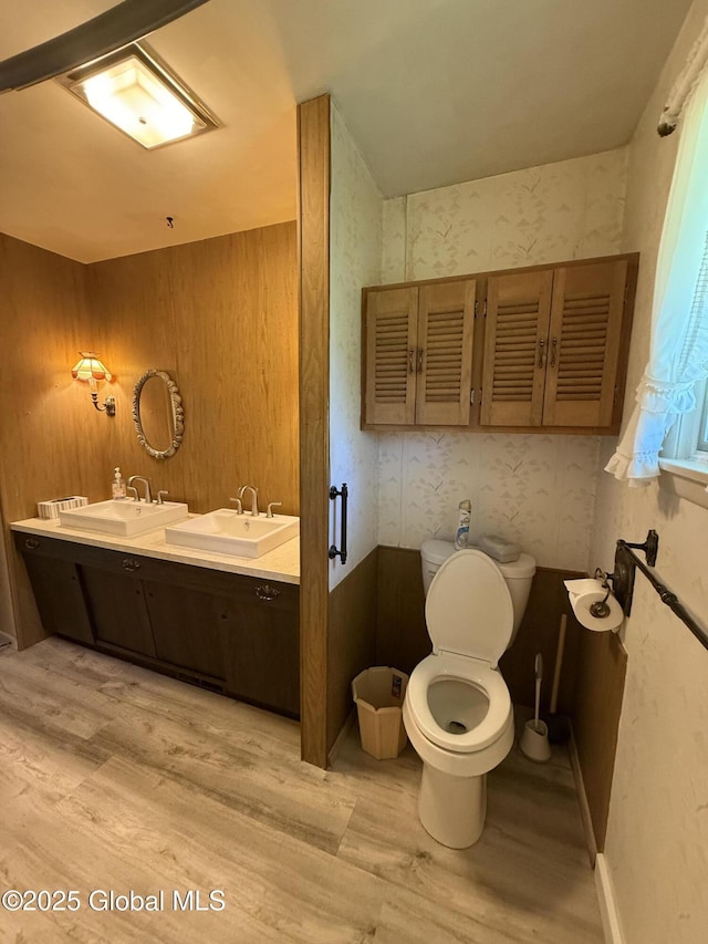 24 Regina Ln, Amsterdam, NY 12010 - full bath featuring wood finished floors and double vanity