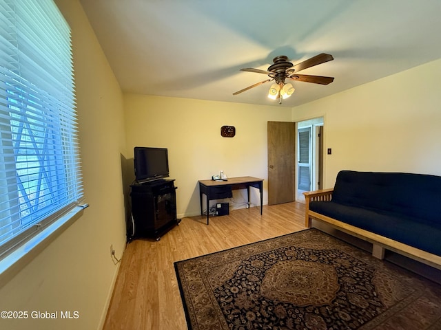 24 Regina Ln, Amsterdam, NY 12010 - living area featuring light wood-type flooring and ceiling fan