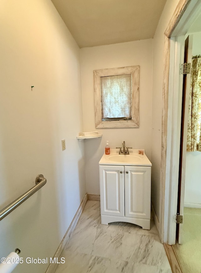 24 Regina Ln, Amsterdam, NY 12010 - bathroom with vanity, marble finish flooring, and plenty of natural light