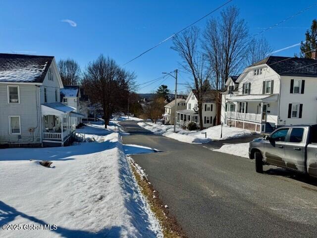 view of road featuring a residential view