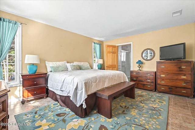 bedroom with visible vents