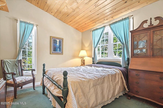 carpeted bedroom featuring baseboards, multiple windows, wood ceiling, and lofted ceiling