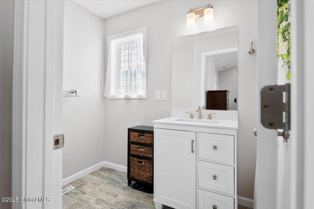 13 Alexander Way, Hudson Falls, NY 12839 - bathroom with vanity and baseboards