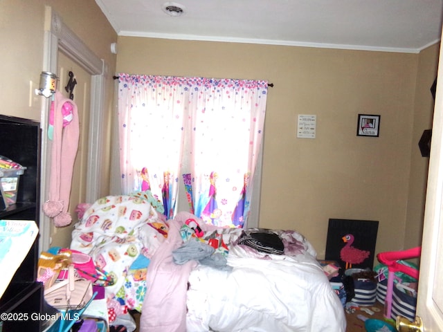 bedroom featuring ornamental molding