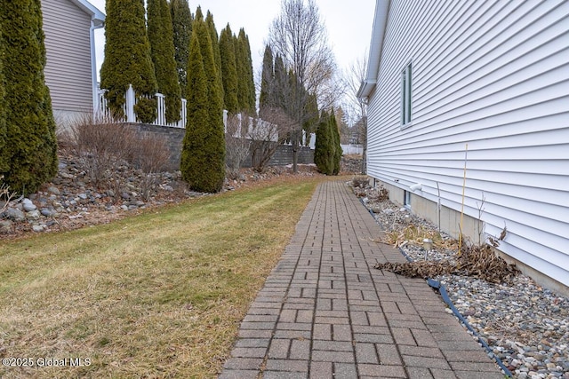 view of yard featuring fence