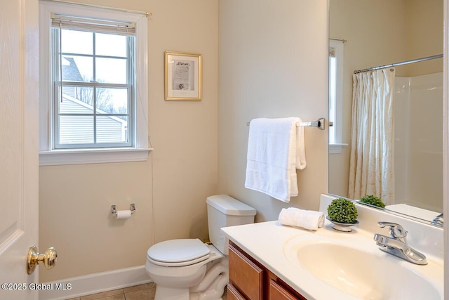 bathroom with tile patterned floors, a shower with curtain, toilet, baseboards, and vanity