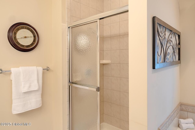 bathroom featuring a stall shower