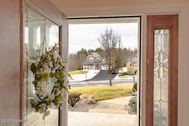 doorway to outside featuring a wealth of natural light