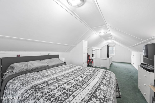 carpeted bedroom with vaulted ceiling