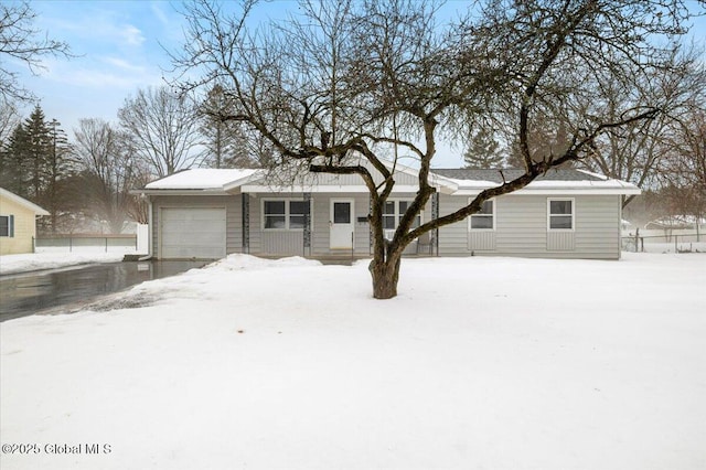 single story home with a garage