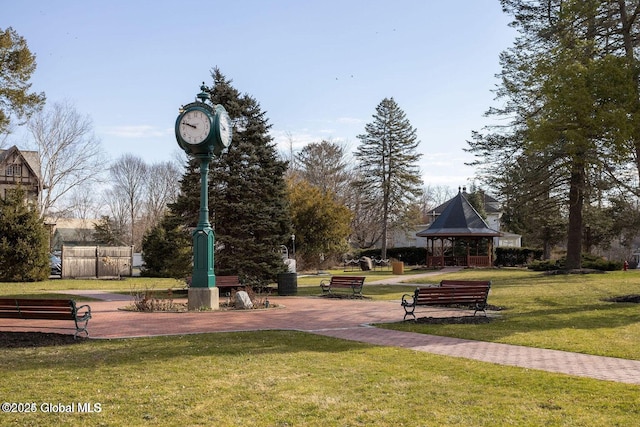 view of property's community featuring a gazebo and a lawn