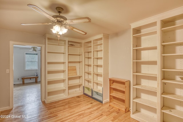 interior space featuring ceiling fan