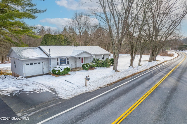 ranch-style home featuring an attached garage