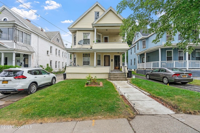 view of front facade with a porch and a front lawn