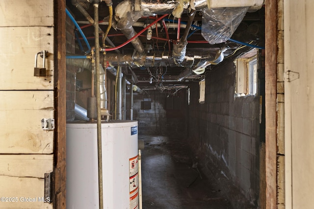 utility room featuring water heater