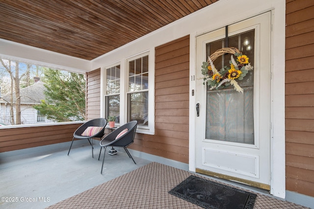 doorway to property with a porch