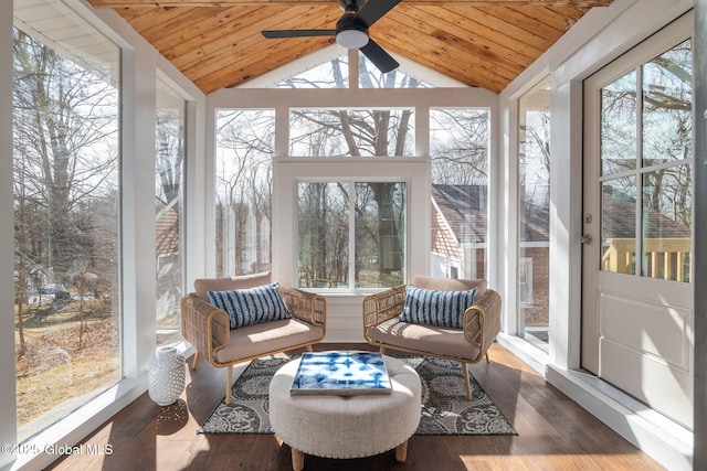 sunroom with wood ceiling, ceiling fan, and vaulted ceiling