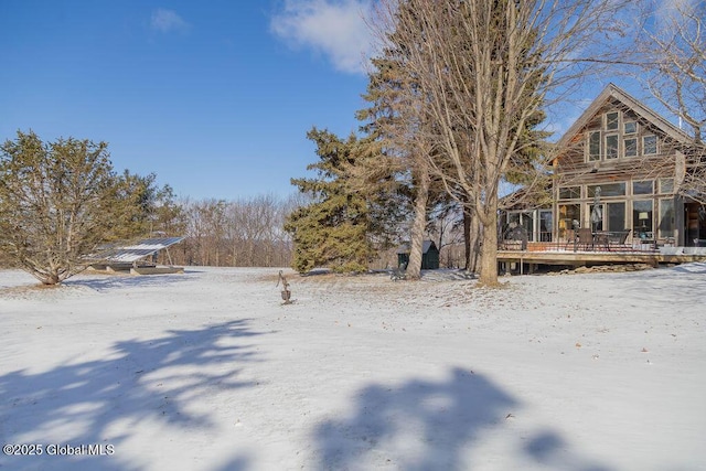 view of yard covered in snow