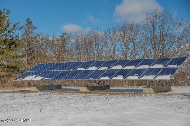 exterior space featuring ground mounted solar panels