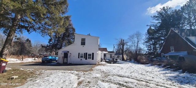 view of snow covered property