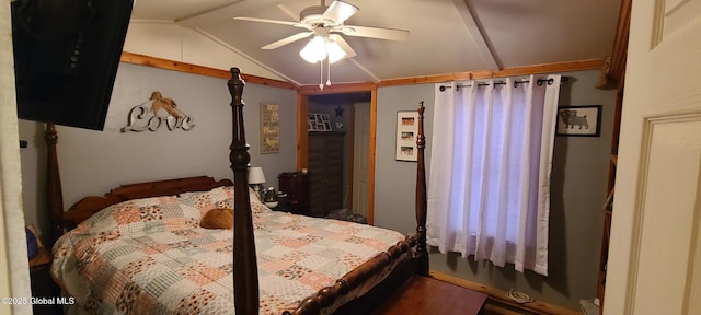 bedroom with lofted ceiling and a ceiling fan