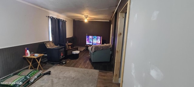 interior space with wainscoting and wood finished floors