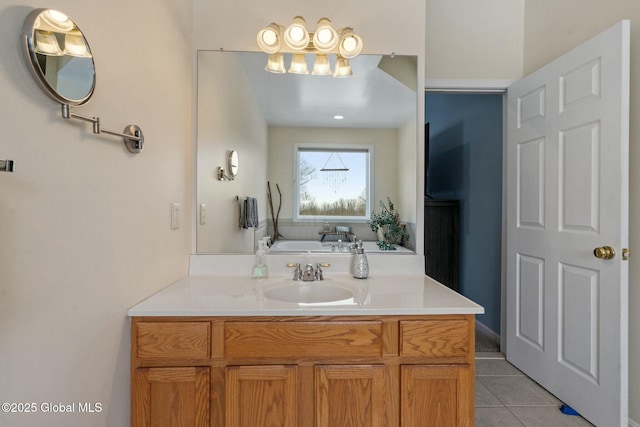 bathroom with vanity and tile patterned floors